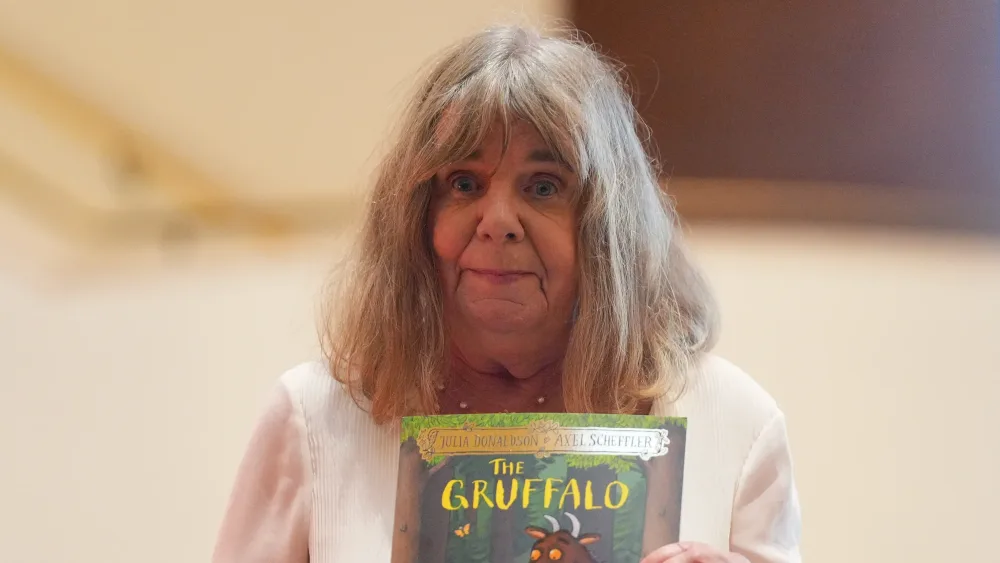 Author Julia Donaldson reading The Gruffalo and The Gruffalo’s Child to local families during an event at the British Library in London