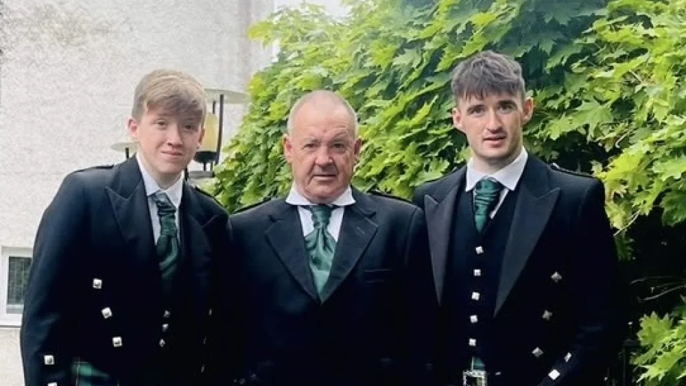 Alasdair Iain (right) with his brother Andrew James (left) and father Donald (centre)