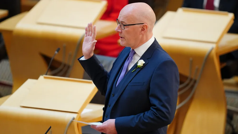 As leader of the largest party at Holyrood, John Swinney was the first MSP sworn in on Thursday. (Jane Barlow/PA)