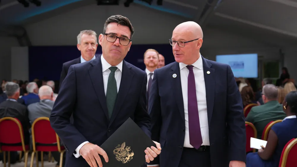 Andy Burnham talking to John Swinney