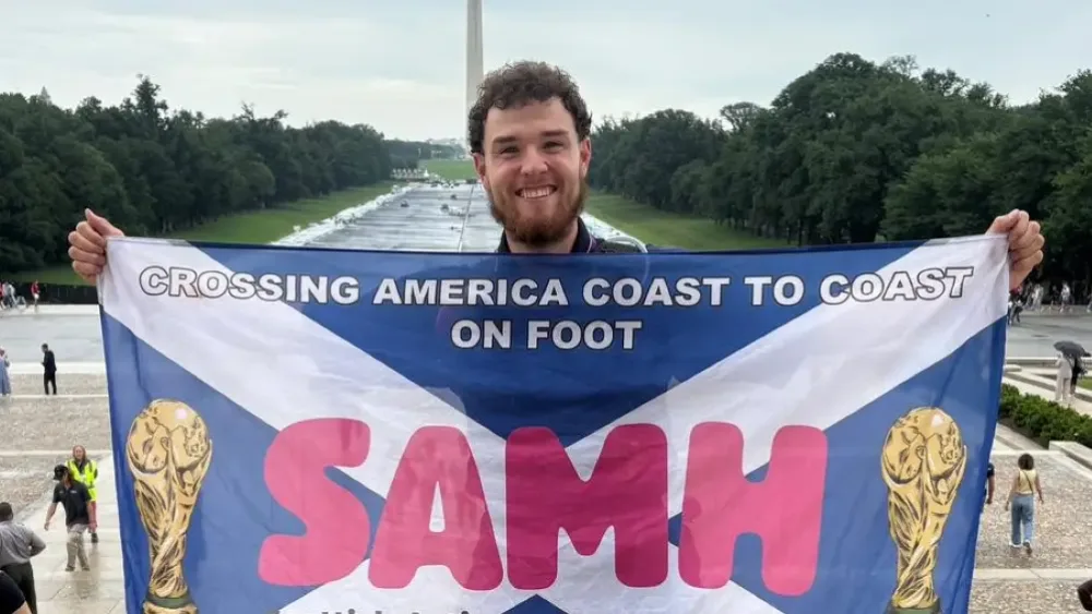 Craig Ferguson holding a saltire in Washington DC