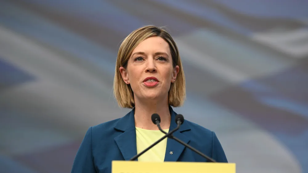 Jenny Gilruth speaking from a lectern