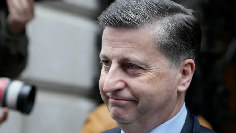Douglas Alexander smiles for the camera