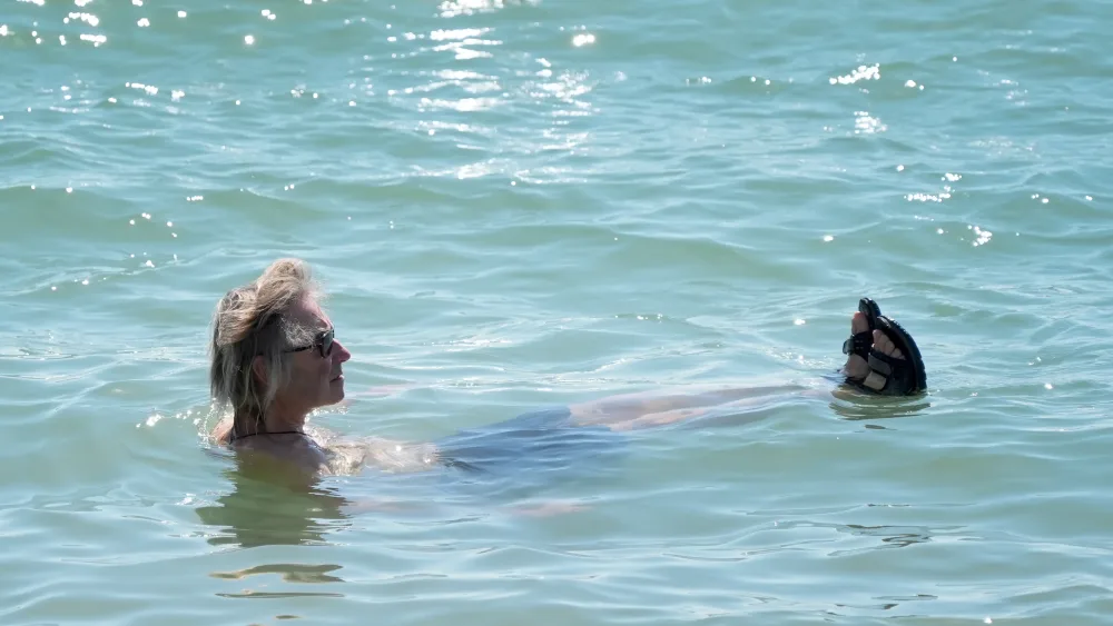 A man floats in water