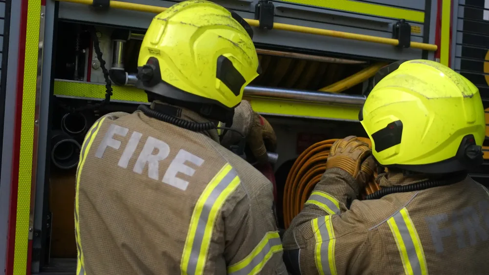 Firefighters at fire engine