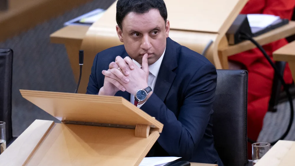 Anas Sarwar seated in Holyrood