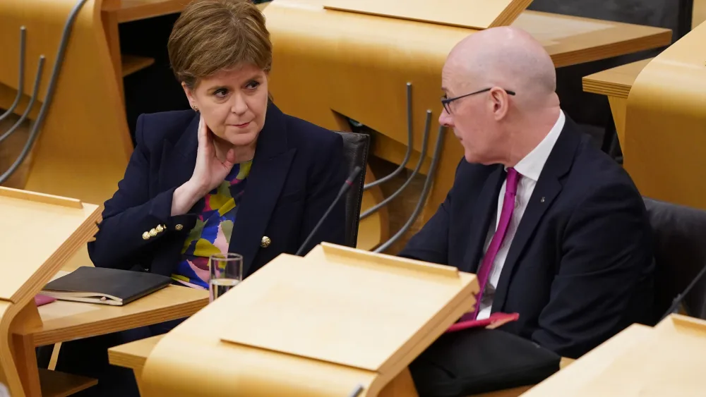 Nicola Sturgeon and John Swinney at the Scottish Parliament in 2024 