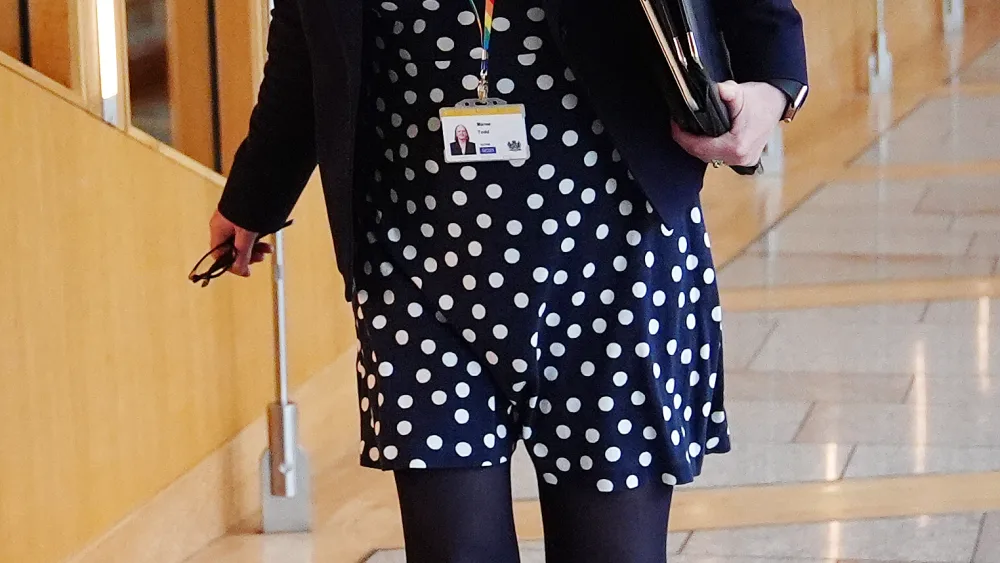 Maree Todd walking through a corridor at Holyrood