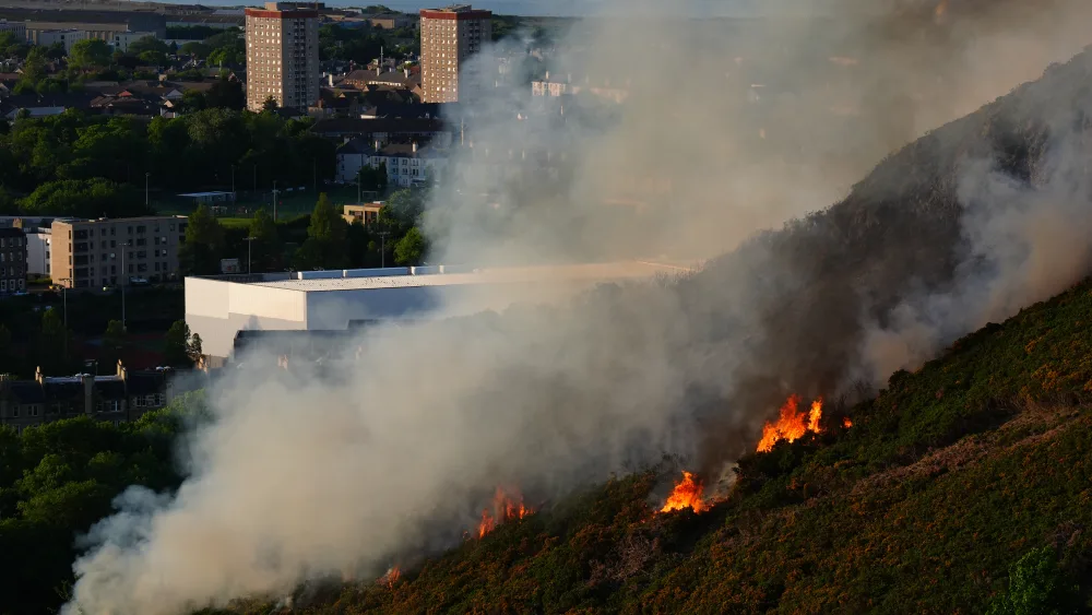 Flames and smoke rise from a fire close to the ruins of St Anthony’s Chapel in Holyrood Park, Edinburgh