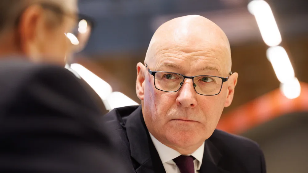 John Swinney on a visit to a health hub