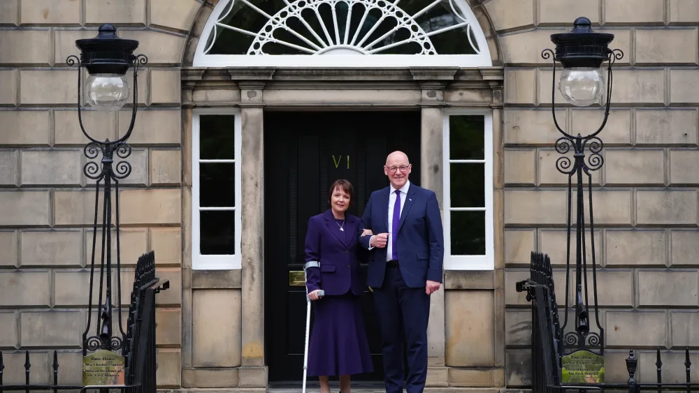 John Swinney with his wife Elizabeth outside Bute House in Edinburgh