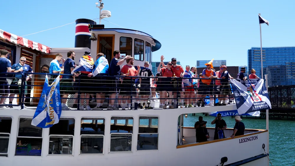 Scotland fans on a boat