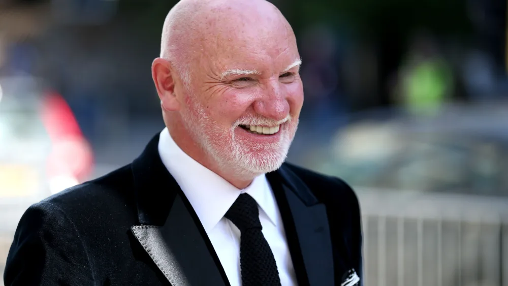 Sir Tom Hunter smiling