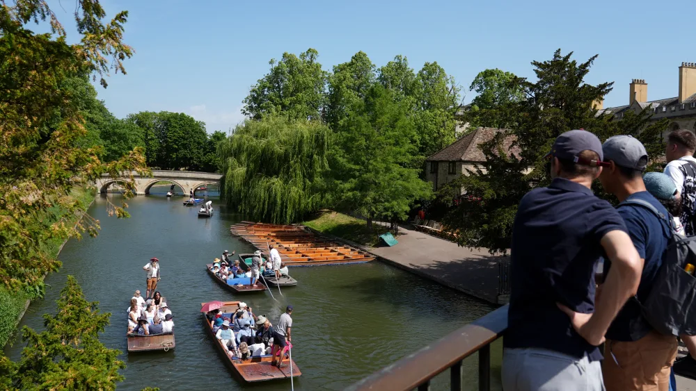 People punting along the River Cam in Cambridge