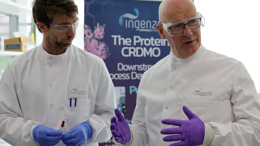 John Swinney in a white coat