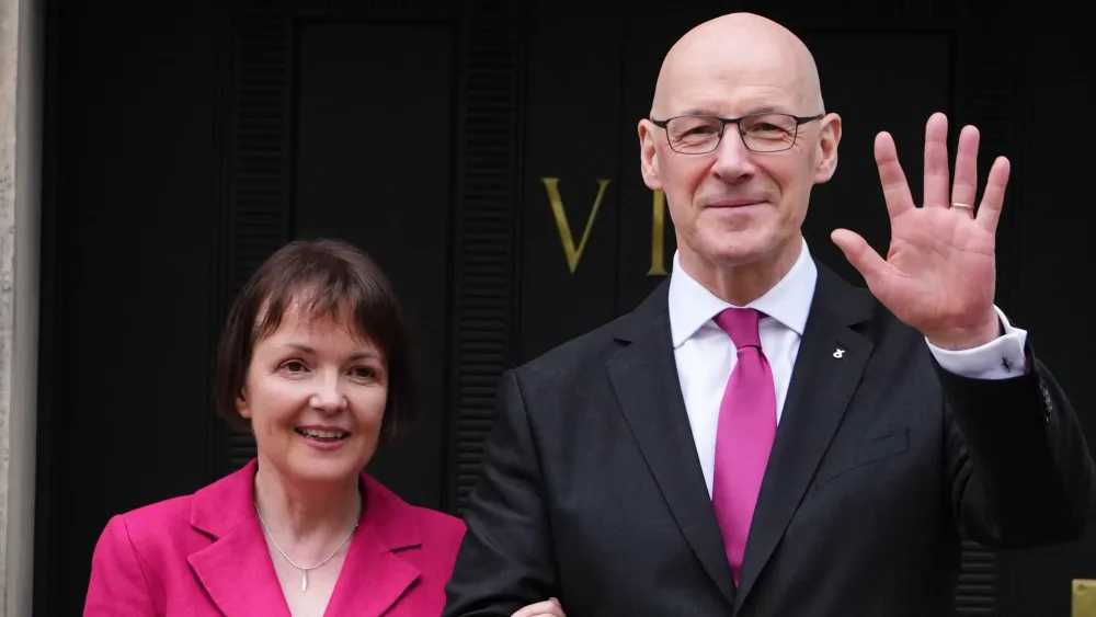 Elizabeth Quigley and John Swinney smiling