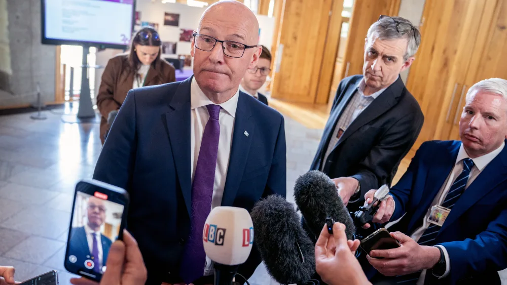John Swinney told journalists he did not know how much money his party could owe HMRC. (Jane Barlow/PA)