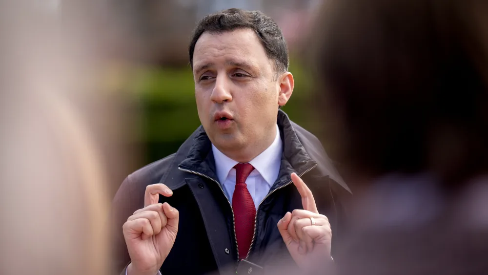 Anas Sarwar pointing with both hands while speaking