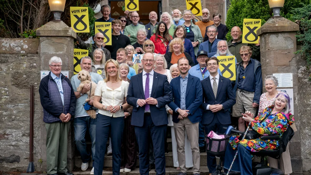 Lara Bird celebrated her byelection win with First Minister and SNP leader John Swinney and local SNP activists. (Jane Barlow/PA)