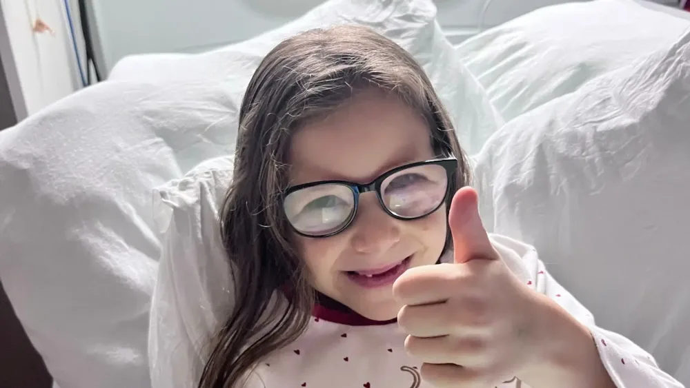Romyn Winters in a hospital bed