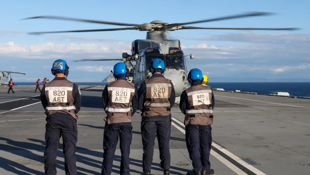 Merlin MK2 helicopters from 814 and 820 Naval Air Squadron embark on HMS Prince of Wales