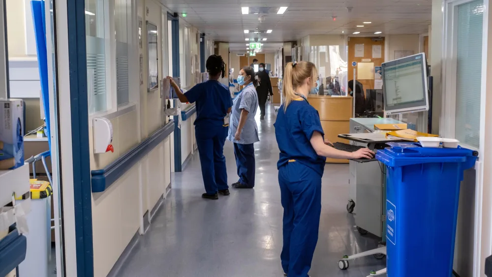 Nurses working in a busy hospital ward