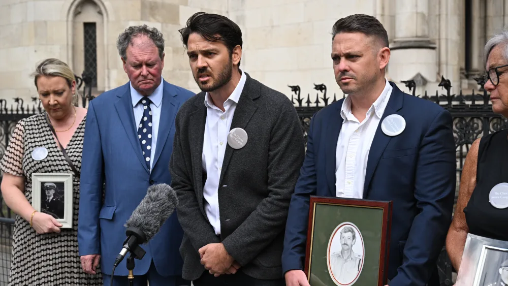 Andy Tobias (centre) speaking before Tuesday's hearing (Doug Peters/PA)