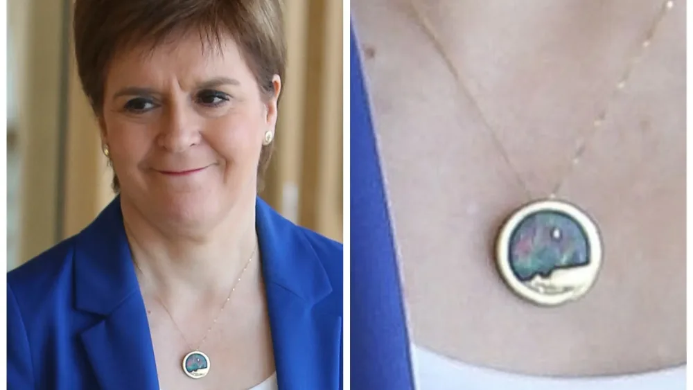 Murrell bought pendant with embezzled funds