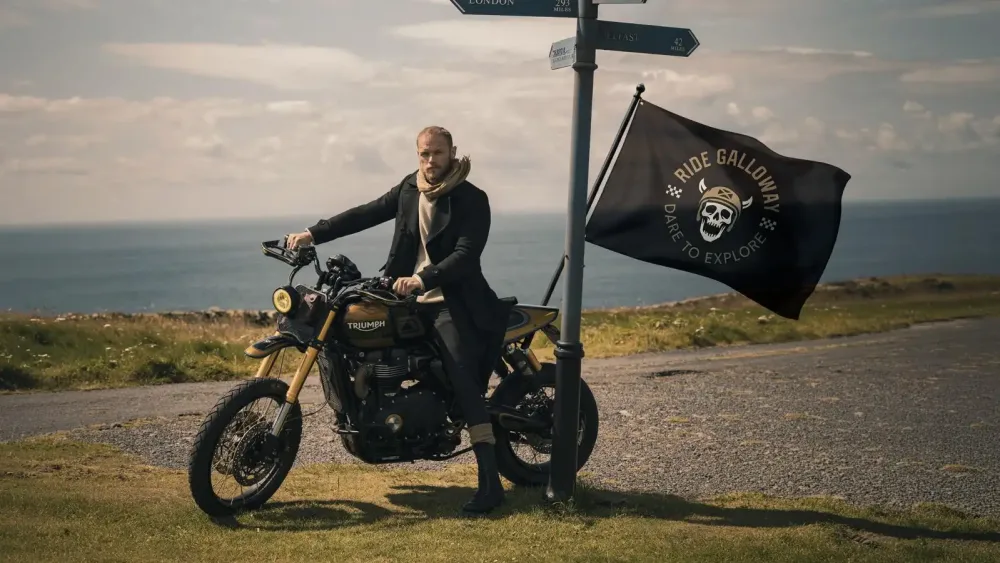 Outlander star Sam Heughan on a motorbike