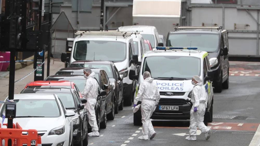 Forensic officers on site at the Park Inn Hotel after several stabbings in Glasgow
