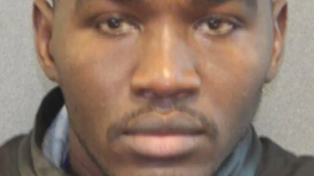 A police mugshot of Badreddin Abdalla Adam Bosh