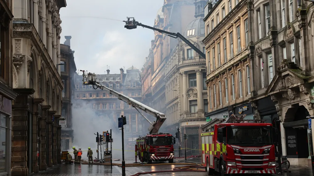 Firefighters working at the scene on Gordon Street