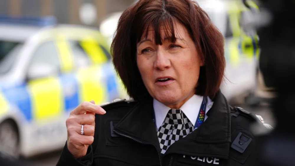 Head and shoulders photo of Jo Farrell speaking