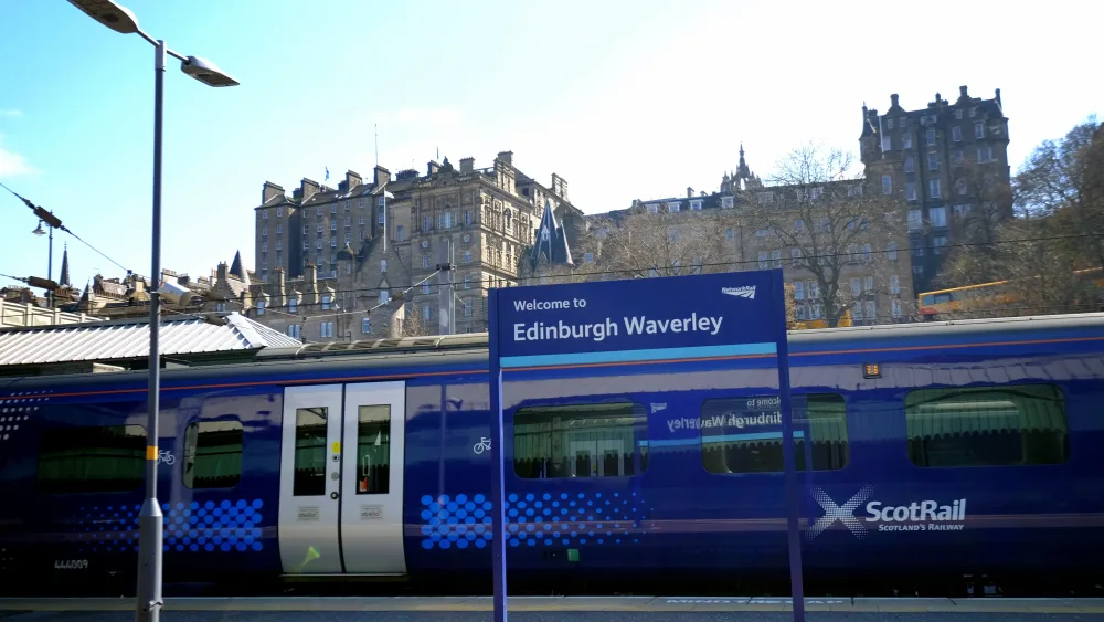 A ScotRail train on the platform at Edinburgh Waverley