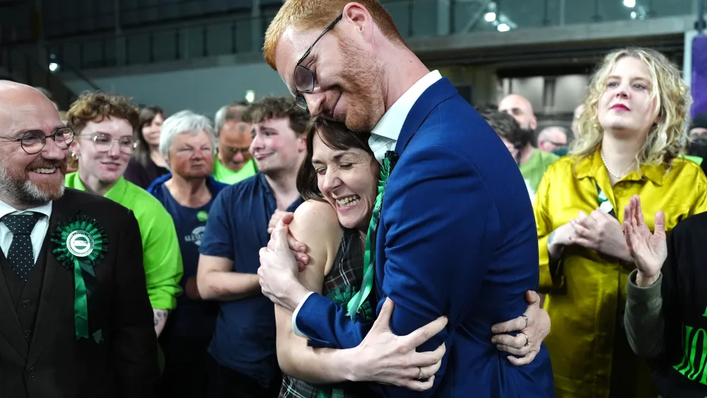 Ross Greer celebrates with new Glasgow Southside MSP Holly Bruce