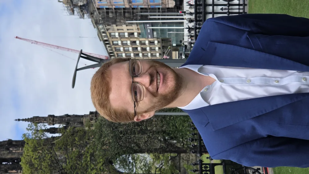 Ross Greer grins