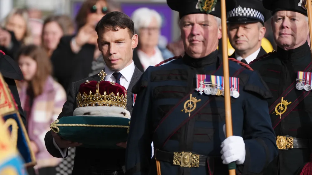 Crown of Scotland being carried on a cushion as part of a procession