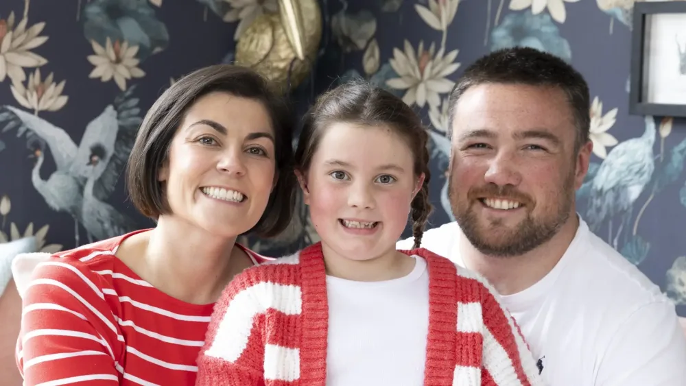 Iona Fagerson, seven, pictured at home with rugby star dad Zander Fagerson and mum Yasmine