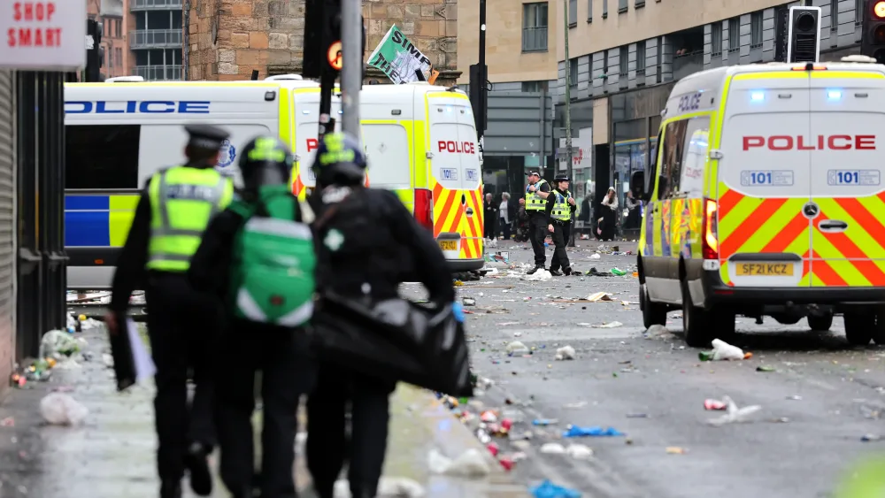 Police on the streets of Glasgow after Celtic won the title