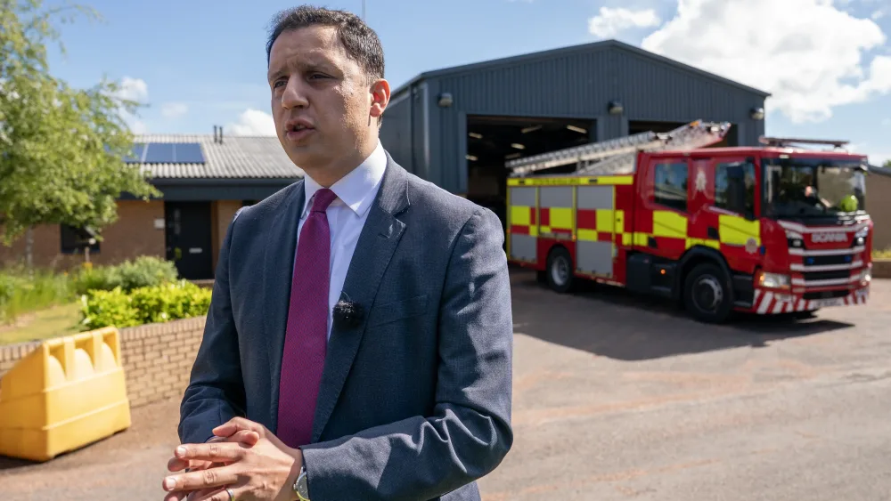 Anas Sarwar standing in front of a fire engine