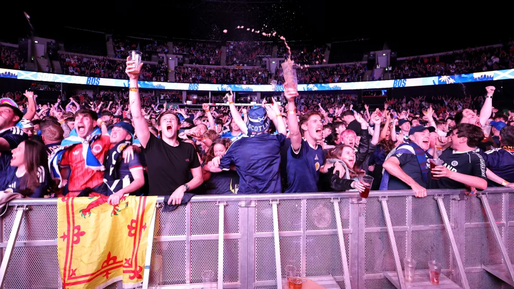 Fans celebrating at the Hydro fan zone during the Haiti game