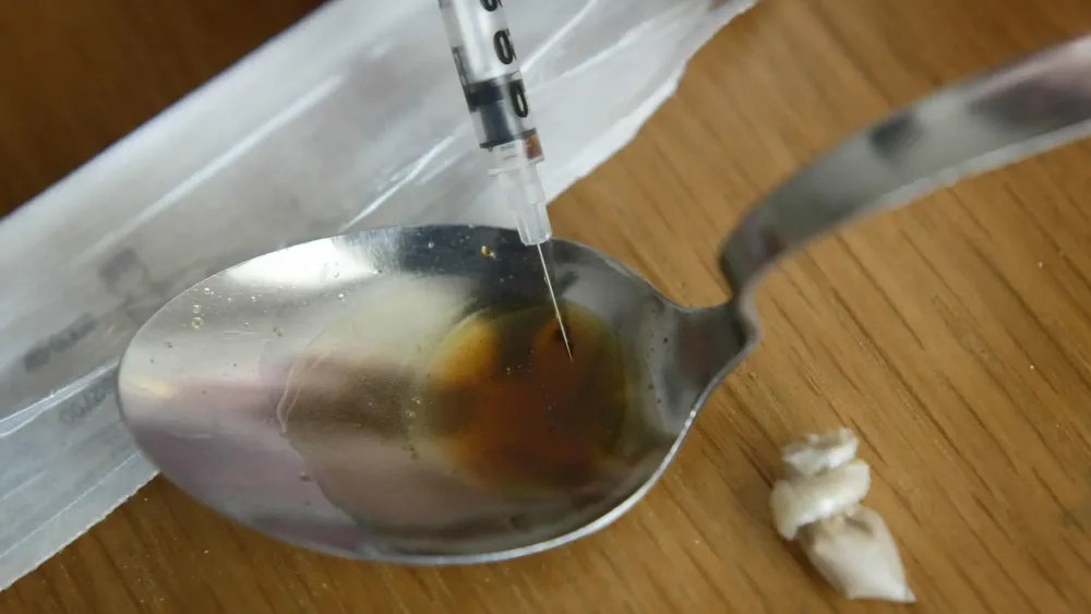 A syringe and a spoon