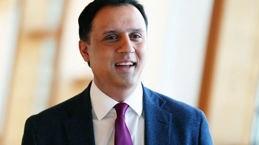 Scottish Labour leader Anas Sarwar walks through the Scottish Parliament