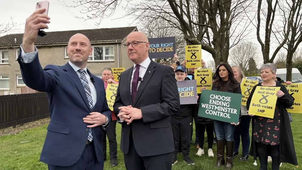 Neil Gray and John Swinney 