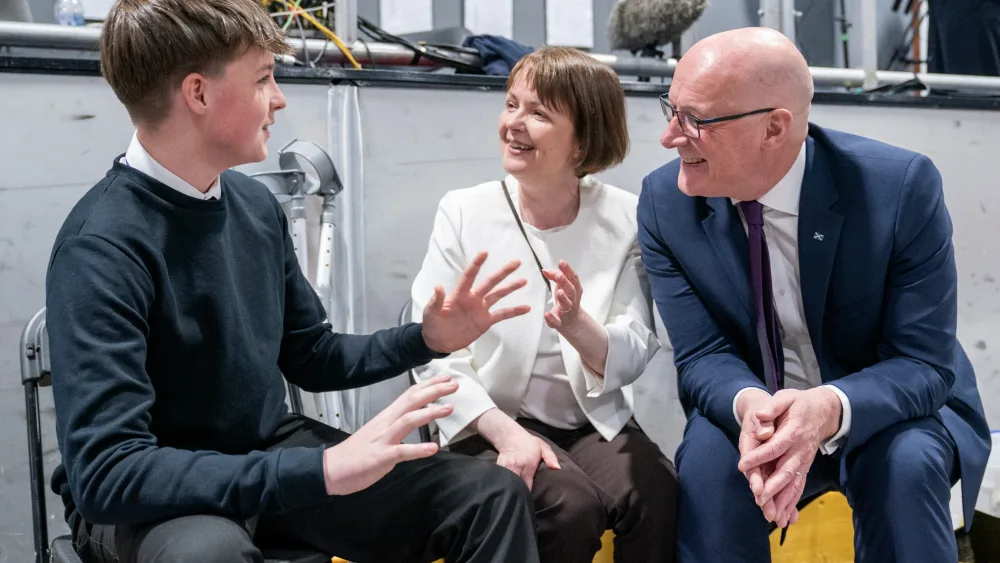John Swinney with his wife Elizabeth and son Matthew