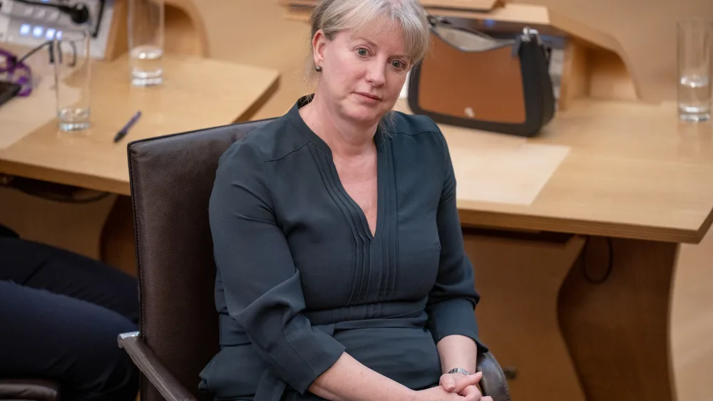 Shona Robison seated in Holyrood