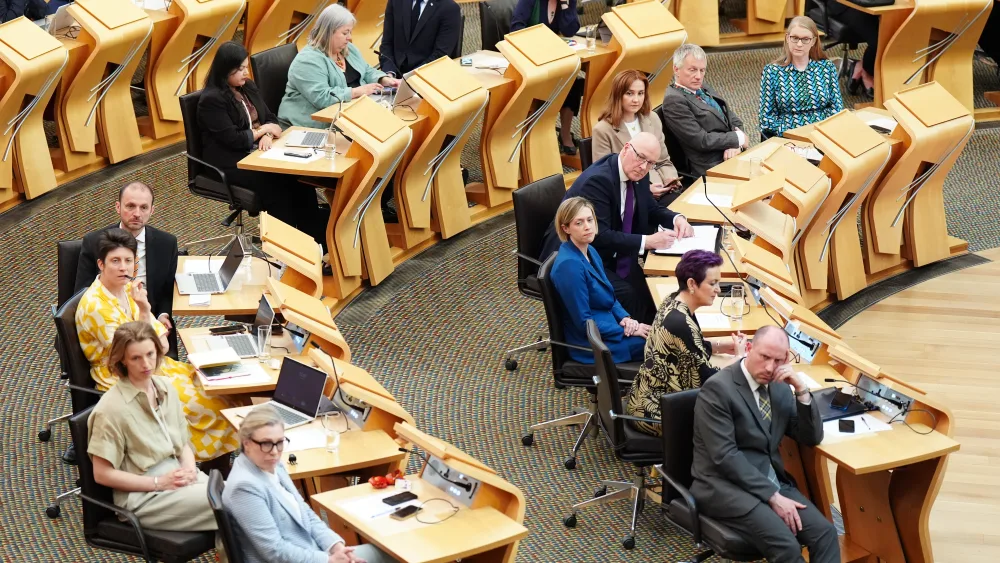John Swinney, Cabinet ministers and SNP MSPs on the Holyrood benches
