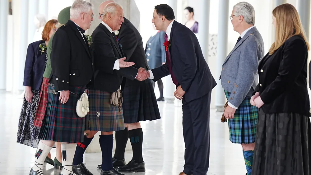 The King is greeted by Scottish Labour leader Anas Sarwar (third right)