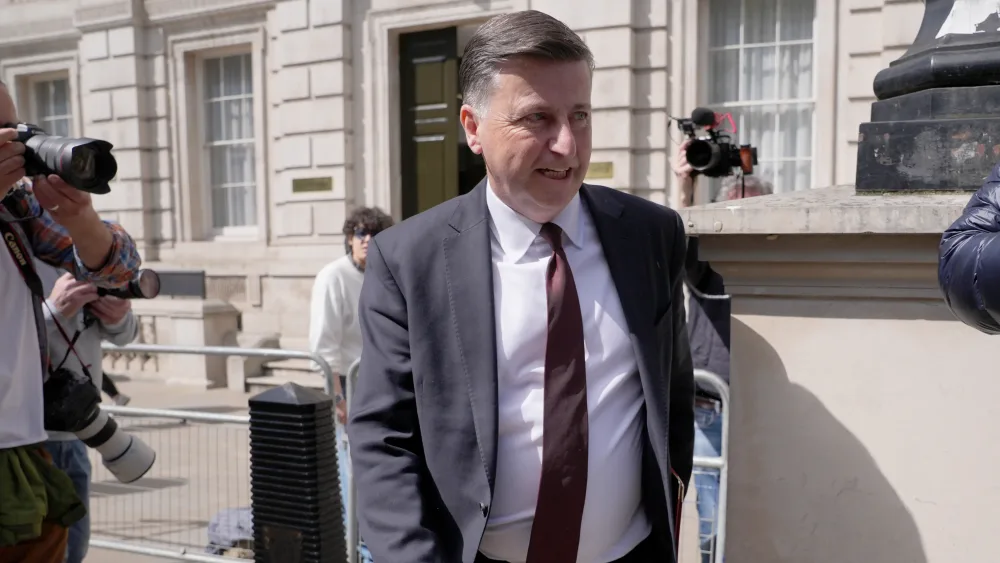 Scottish Secretary Douglas Alexander leaves a Cabinet meeting