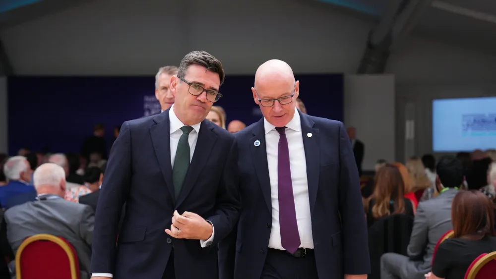 Andy Burnham talking to John Swinney